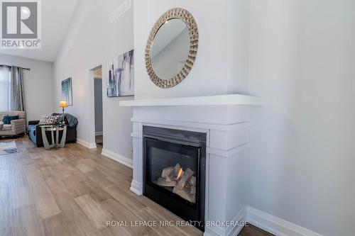 #1 -7472 Mountain Rd, Niagara Falls, ON - Indoor Photo Showing Living Room With Fireplace