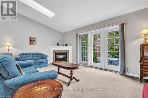 #9 -556 King St, Niagara-On-The-Lake, ON - Indoor Photo Showing Living Room With Fireplace