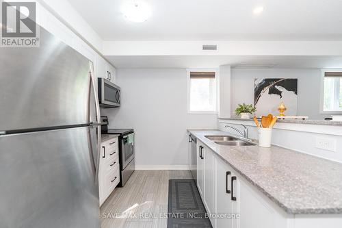 B12 - 190 Century Hill Drive, Kitchener, ON - Indoor Photo Showing Kitchen With Double Sink