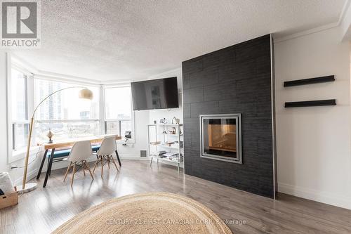 #810 -600 Talbot St, London, ON - Indoor With Fireplace