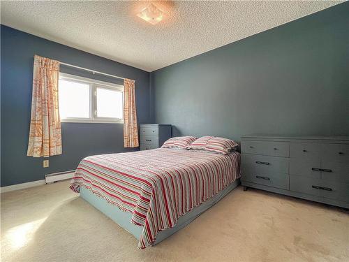 295 Queen Street E, Virden, MB - Indoor Photo Showing Bedroom