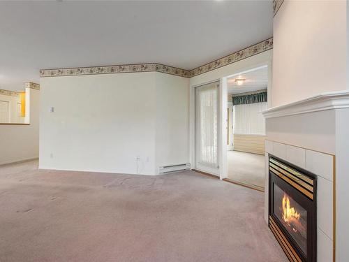 102-2050 Quebec Street, Penticton, BC - Indoor With Fireplace