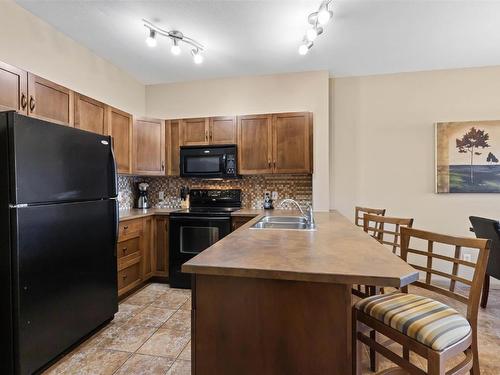 504-654 Cook Road, Kelowna, BC - Indoor Photo Showing Kitchen With Double Sink