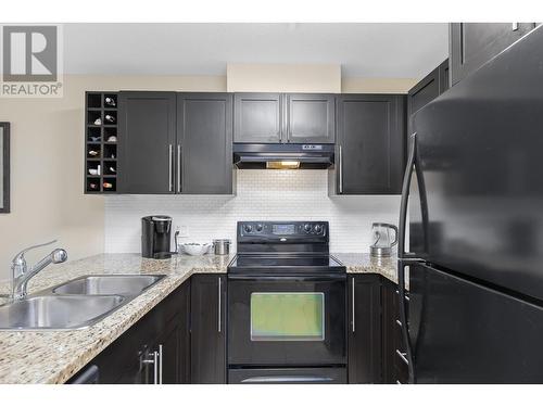 1093 Sunset Drive Unit# 214, Kelowna, BC - Indoor Photo Showing Kitchen With Double Sink