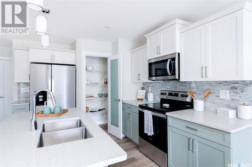 435 Myles Heidt Manor, Saskatoon, SK - Indoor Photo Showing Kitchen With Stainless Steel Kitchen With Double Sink With Upgraded Kitchen