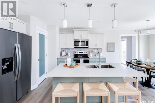 435 Myles Heidt Manor, Saskatoon, SK - Indoor Photo Showing Kitchen With Stainless Steel Kitchen With Double Sink With Upgraded Kitchen