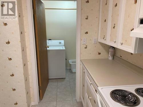 5003 Kyllo Road, 108 Mile Ranch, BC - Indoor Photo Showing Laundry Room