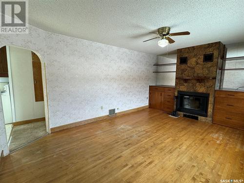 306 3Rd Avenue W, Biggar, SK - Indoor With Fireplace