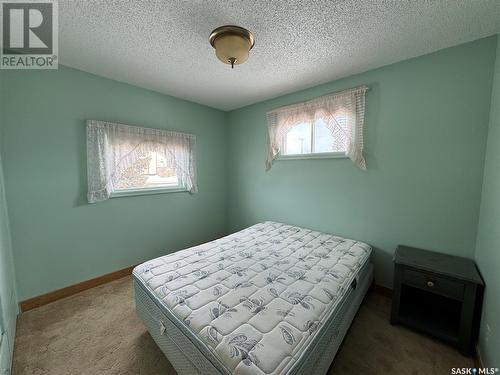 306 3Rd Avenue W, Biggar, SK - Indoor Photo Showing Bedroom