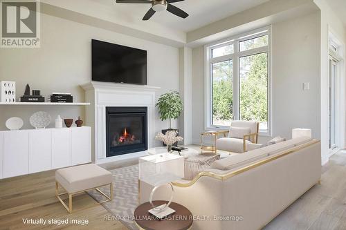 22 Coldbrook Dr, Cavan Monaghan, ON - Indoor Photo Showing Living Room With Fireplace