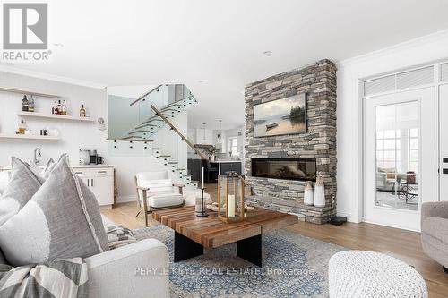 1224 Golden Beach Rd, Bracebridge, ON - Indoor Photo Showing Living Room With Fireplace