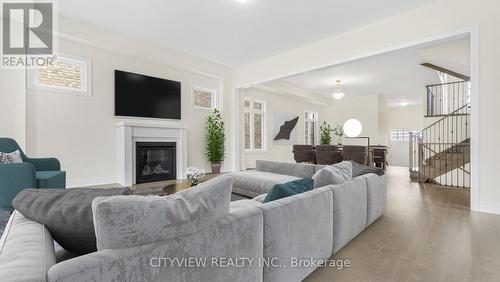 22 Settlers Road, Oakville, ON - Indoor Photo Showing Living Room With Fireplace