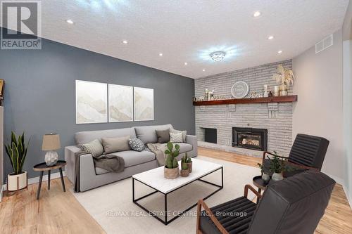 92 Downey Rd, Guelph, ON - Indoor Photo Showing Living Room With Fireplace