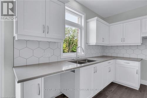 58 Aspen Pkwy, Aylmer, ON - Indoor Photo Showing Kitchen With Double Sink
