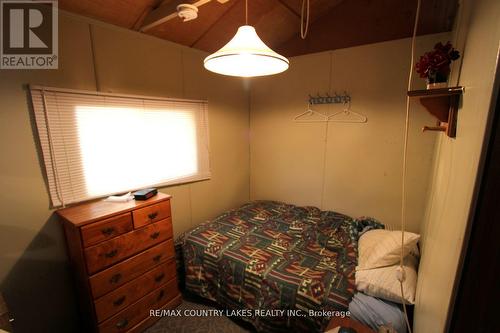 194 Mcguire Beach Road, Kawartha Lakes, ON - Indoor Photo Showing Bedroom