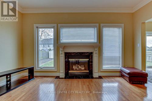 328 Plane Tree Drive, London, ON - Indoor Photo Showing Living Room With Fireplace