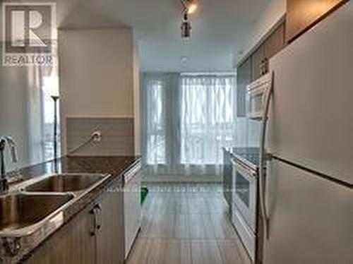 512 - 80 Esther Lorrie Drive, Toronto, ON - Indoor Photo Showing Kitchen With Double Sink