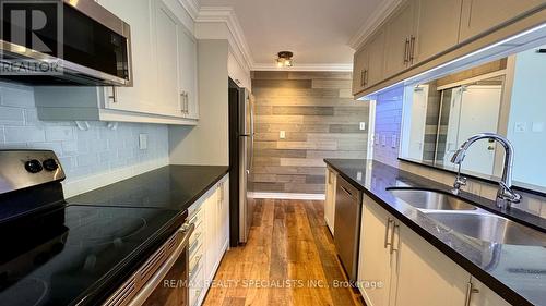 217 - 4185 Shipp Drive, Mississauga, ON - Indoor Photo Showing Kitchen With Double Sink