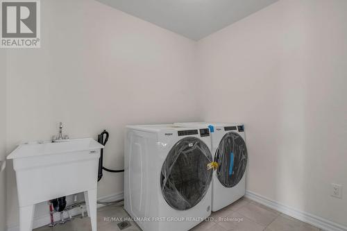 33 Mountainside Crescent, Whitby, ON - Indoor Photo Showing Laundry Room