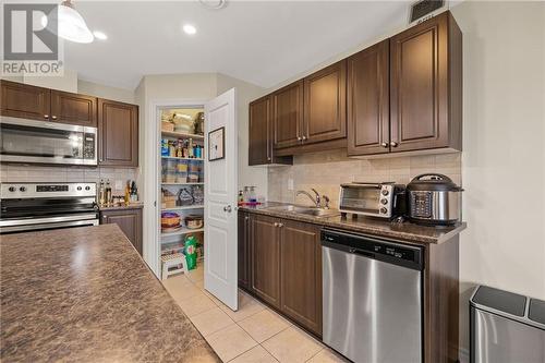 345 Tribeca Private Unit#11, Barrhaven, ON - Indoor Photo Showing Kitchen With Double Sink