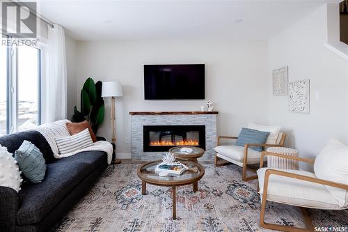 433 Myles Heidt Manor, Saskatoon, SK - Indoor Photo Showing Living Room With Fireplace