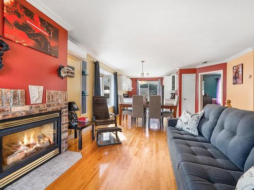 Living room - 1066 Boul. Alexis-Lebert, Saint-Jean-Sur-Richelieu, QC - Indoor Photo Showing Living Room With Fireplace