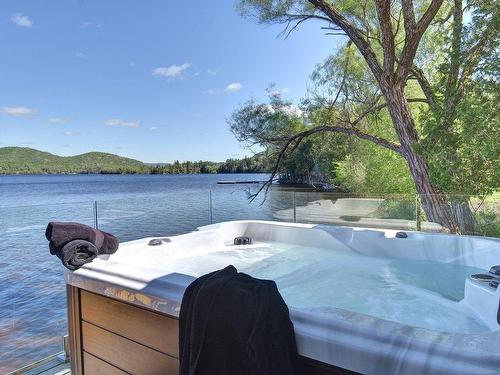 Spa - 2372 Rue Labelle, Mont-Tremblant, QC - Outdoor With Body Of Water With View
