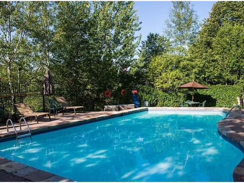 Pool - 249-140 Ch. Au Pied-De-La-Montagne, Mont-Tremblant, QC - Outdoor With In Ground Pool With Backyard