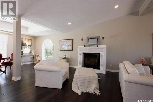 220 Battleford Trail, Swift Current, SK - Indoor Photo Showing Living Room With Fireplace