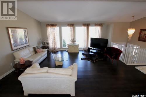 220 Battleford Trail, Swift Current, SK - Indoor Photo Showing Other Room With Fireplace