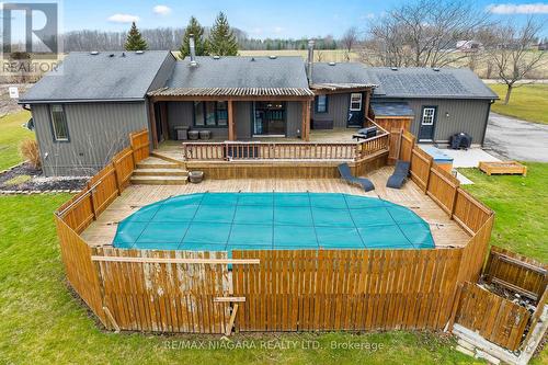 1791 White Rd, Port Colborne, ON - Outdoor With Above Ground Pool With Deck Patio Veranda With Backyard