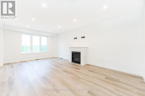 152 Walsh St, Wellington North, ON - Indoor Photo Showing Living Room With Fireplace