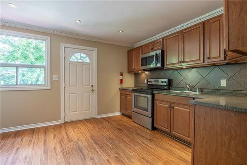 49 Spadina Avenue, Hamilton, ON - Indoor Photo Showing Kitchen With Double Sink