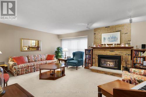 92 Meridene Cres W, London, ON - Indoor Photo Showing Living Room With Fireplace