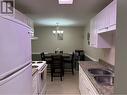 1410 Penticton Avenue Unit# 102, Penticton, BC  - Indoor Photo Showing Kitchen With Double Sink 