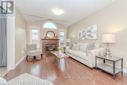 7 Henderson Drive, Guelph, ON - Indoor Photo Showing Living Room With Fireplace