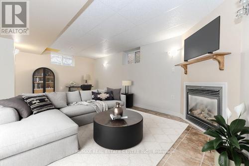 7 Henderson Drive, Guelph, ON - Indoor Photo Showing Living Room With Fireplace
