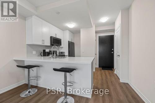 #215 -2750 King St E, Hamilton, ON - Indoor Photo Showing Kitchen With Upgraded Kitchen