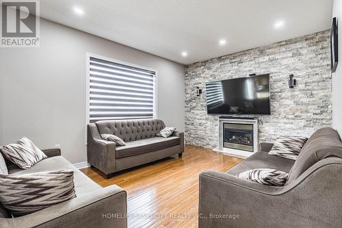 6 Runnymede Crescent, Brampton, ON - Indoor Photo Showing Living Room With Fireplace