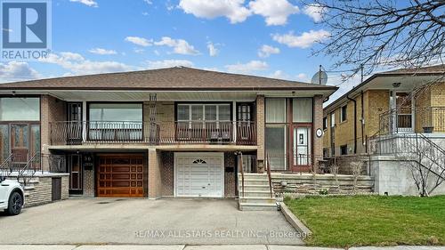 54 Wintergreen Rd, Toronto, ON - Outdoor With Balcony With Facade