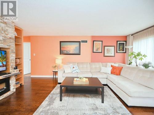 #1602 -50 Elm Dr E, Mississauga, ON - Indoor Photo Showing Living Room With Fireplace