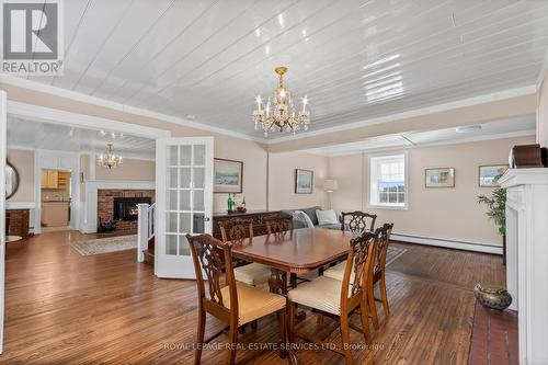 592 Simmons Road, Loyalist, ON - Indoor Photo Showing Dining Room With Fireplace