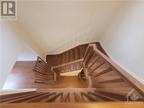 Beautiful Hardwood Staircase - 633 Fisher Street, Kemptville, ON - Indoor Photo Showing Other Room