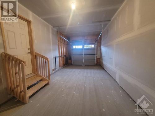 Spacious Garage - 633 Fisher Street, Kemptville, ON - Indoor Photo Showing Other Room