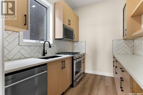 3744 Gee Crescent, Regina, SK - Indoor Photo Showing Kitchen With Double Sink