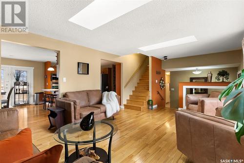 36 Everett Crescent, Regina, SK - Indoor Photo Showing Living Room With Fireplace