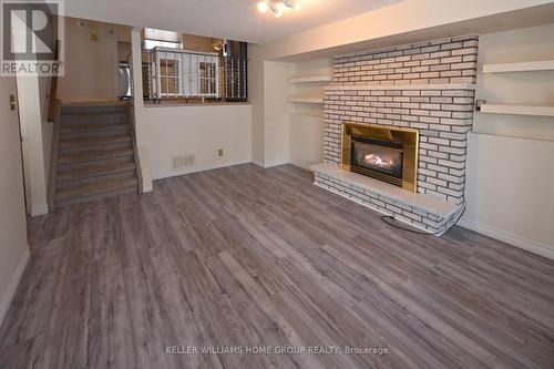 38 Mcgibbon St, North Bay, ON - Indoor Photo Showing Living Room With Fireplace