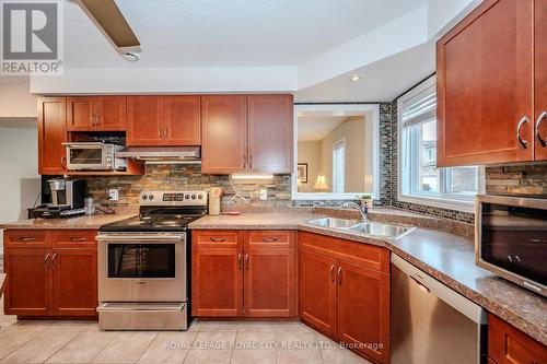 36 - 20 Shackleton Drive N, Guelph, ON - Indoor Photo Showing Kitchen With Double Sink