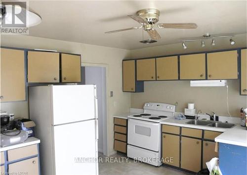 620 Commissioners Road W, London, ON - Indoor Photo Showing Kitchen With Double Sink