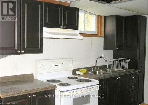 620 Commissioners Road W, London, ON - Indoor Photo Showing Kitchen With Double Sink